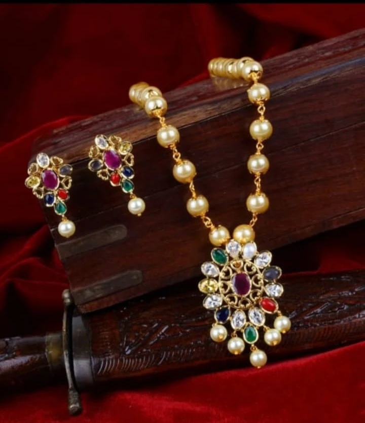 Premium quality Pearl mala with pendant and earrings